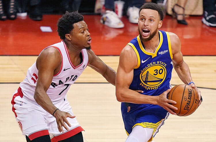 Steph Curry drives to the basket in Game 1 of the Finals.