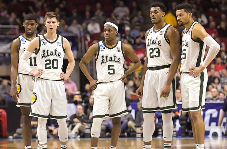 Michigan State Spartans Cassius Winston college basketball betting odds preview and picks.