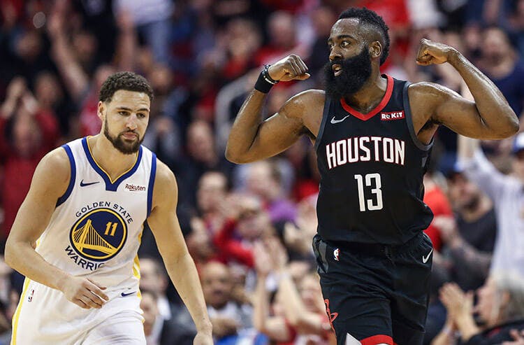 James Harden celebrates a basket against the Warriors.