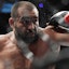 MMA fighter Blagoy Ivanov dodges a strike in UFC action.