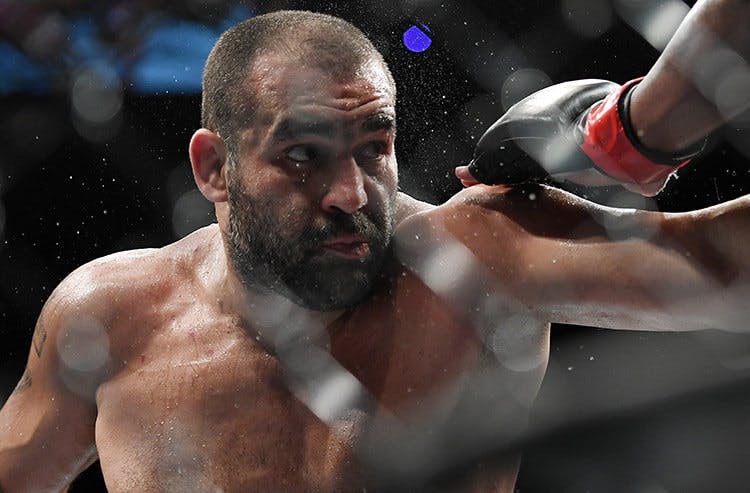 MMA fighter Blagoy Ivanov dodges a strike in UFC action.