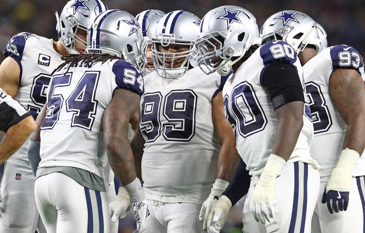 Dallas Cowboys huddle 