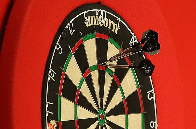 Three darts on a dartboard