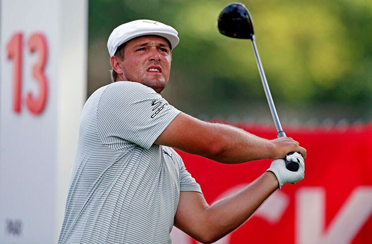 PGA golfer Bryson DeChambeau hits a drive in Round 1 of the Rocket Mortgage Classic.