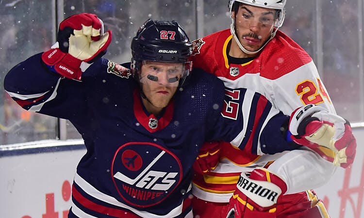 Winnipeg Jets forward Nik Ehlers skates against the Calgary Flames in NHL action.