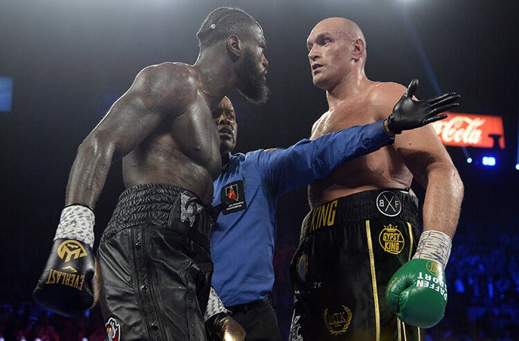 Tyson Fury and Deontay Wilder square off during their second fight.