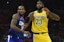 The Clippers Kawhi Leonard guards the Lakers LeBron James in NBA action.