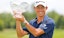 PGA golfer Collin Morikawa celebrates his victory at the Workday Charity Open.