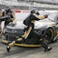 Pit crews race to change tires at Darlington Raceway.