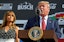US President Donald Trump address an audience at a press conference. 