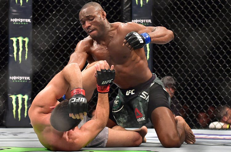 MMA fighter Kamaru Usman throws a punch in UFC action.