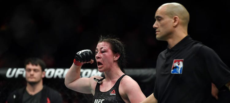 Molly Mccann of the UFC celebrates winning a fight. 